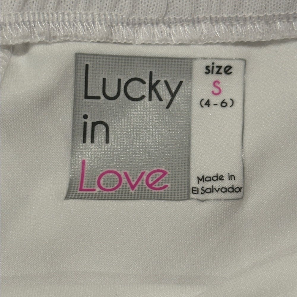Lucky in Love White Tennis Shorts with Floral Accent - Picture 4 of 5
